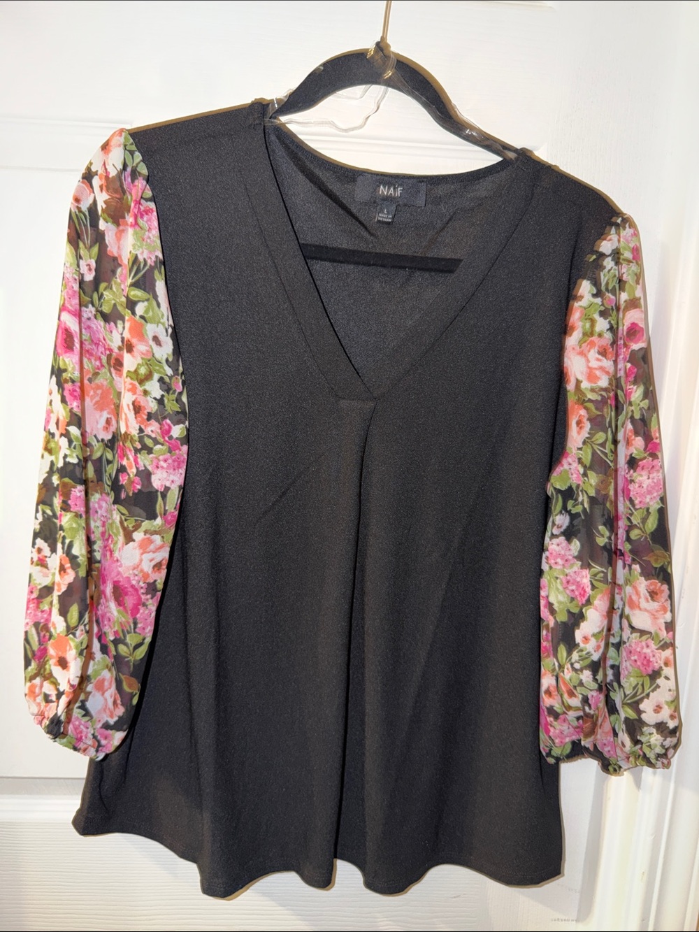 NAIF Black V-Neck Blouse with Pink Floral Puff Sleeves